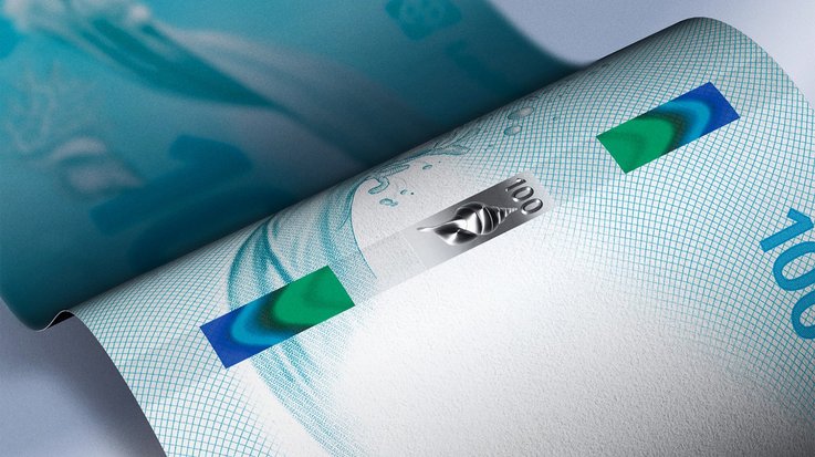 Close up of banknote with Rollingstar security thread