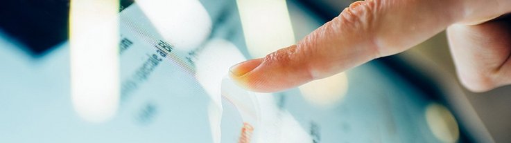 Finger touching a touchscreen