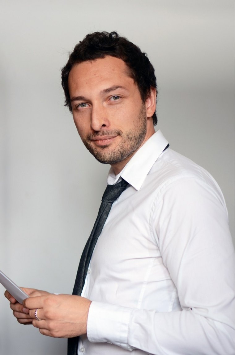 Portrait of Dr. Roman Hartinger, Senior Business Analyst CBDC
