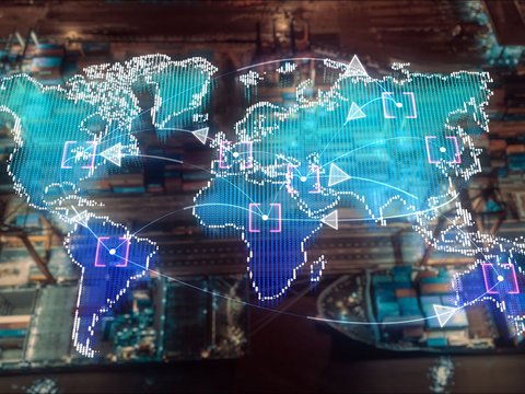 A digital world map with lines, arrows, and markers representing global connectivity and logistics.