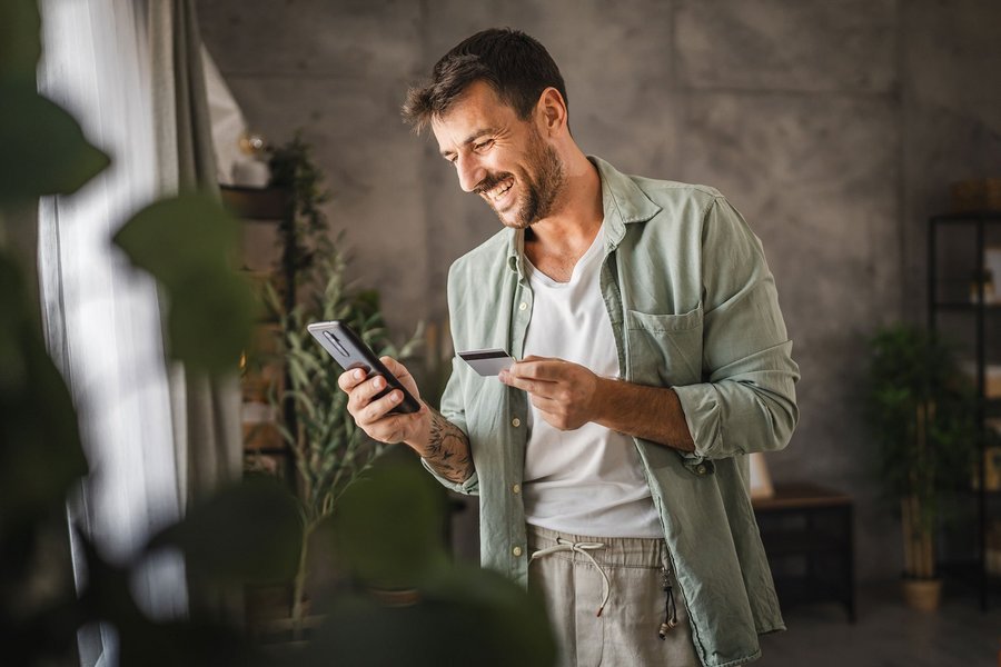 A man checks his credit card date.