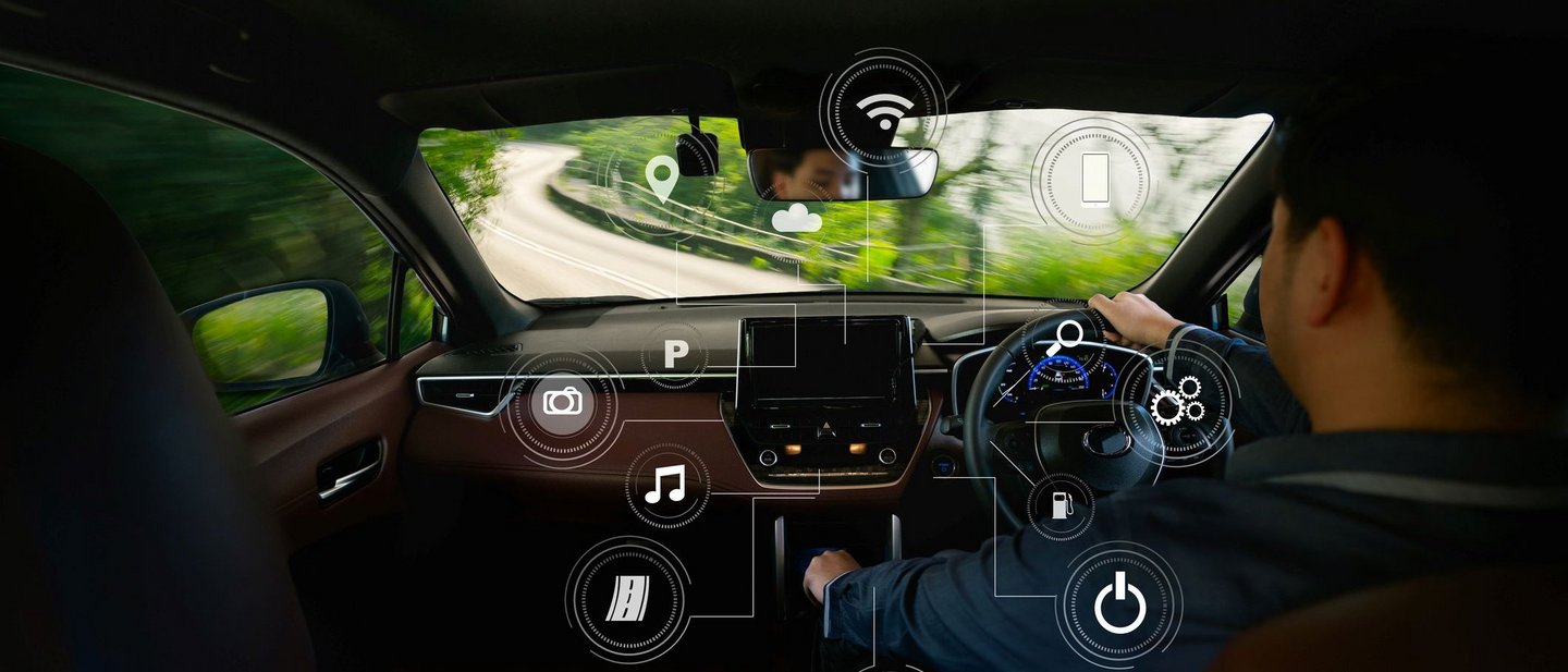 cockpit view of a car driving through forest roads