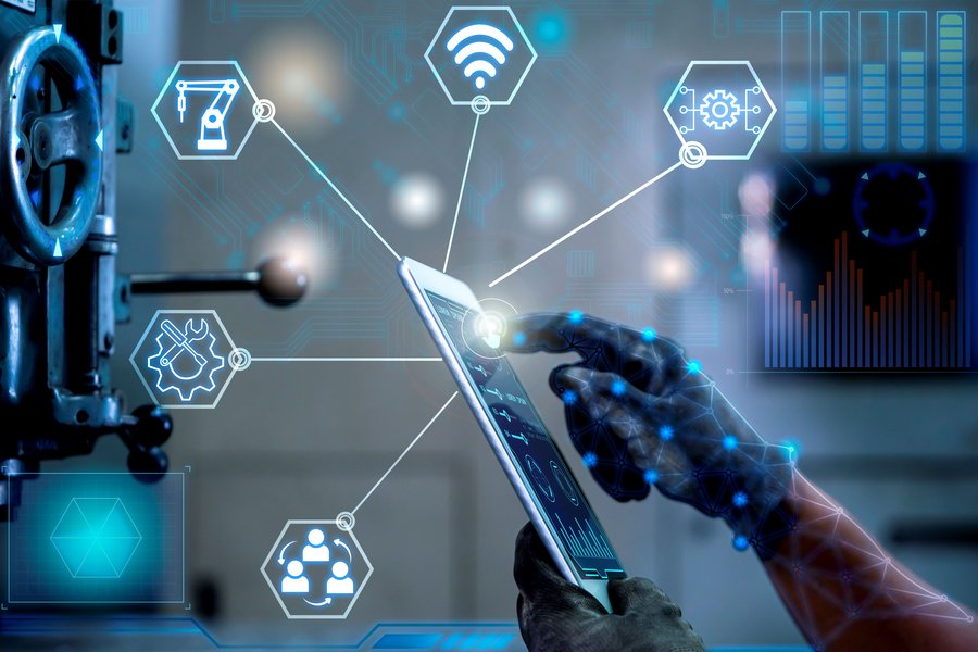 A hand interacting with a tablet, surrounded by digital symbols