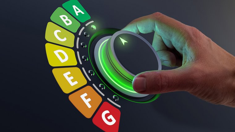 Energy efficiency rating labels promoting low consumption and efficient products to reduce carbon footprint. Lower CO2 emissions with efficient home and appliances. It’s green, eco-friendly business.