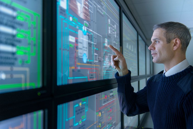 Smart logistics man controls the transports