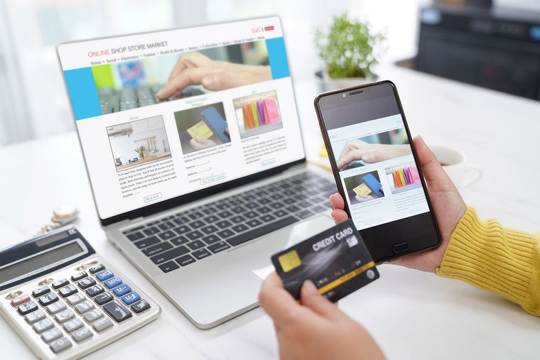 Online Shopping Woman used Computer laptop searching Shop on E-commerce Website and using Smartphone to payment on Digital Payment online gateway by Credit card