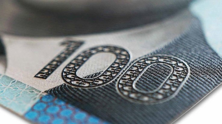 Close up of banknote with value 100