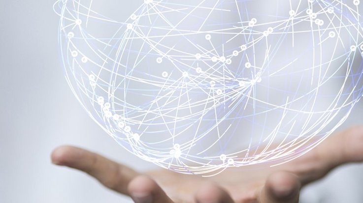 3D visualization of a sphere of luminous lines and dots that seems to float on a hand