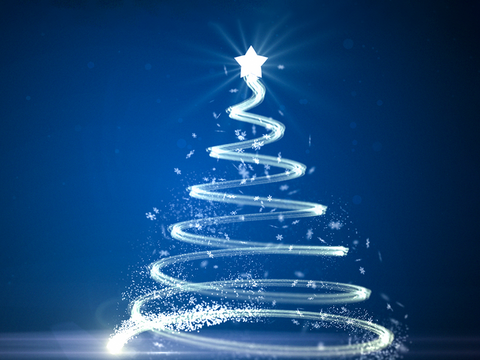 Glowing, spiral-shaped Christmas tree made of light trails with a bright star on top